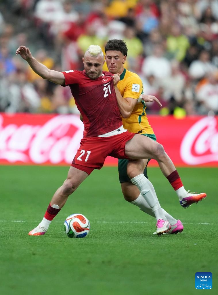 Alessandro Circati (back) of Australia vies with Baris Alper Yilmaz of Türkiye during the group D match between Australia and Türkiye at the 2026 FIFA World Cup at BC Place Vancouver in Vancouver, Canada, June 13, 2026. (Xinhua/Meng Yongmin)