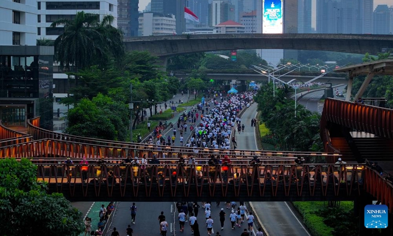 A drone photo shows people participating in the Jakarta International Marathon 2026 in Jakarta, Indonesia, June 14, 2026. (Xinhua/Cen Yunpeng)