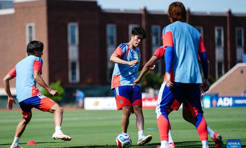 Tomiyasu Takehiro (2nd L) of Japan attends a training session ahead of the group F stage match against the Netherlands at the FIFA World Cup 2026 in Dallas, the United States, on June 13, 2026. (Xinhua/Jia Haocheng)