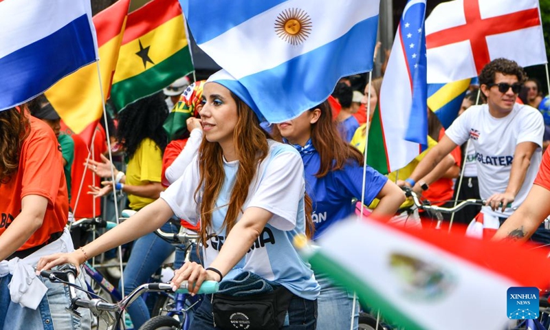People take part in a World Cup parade in Mexico City, capital of Mexico, June 13, 2026. (Xinhua/Alejandro Medina)