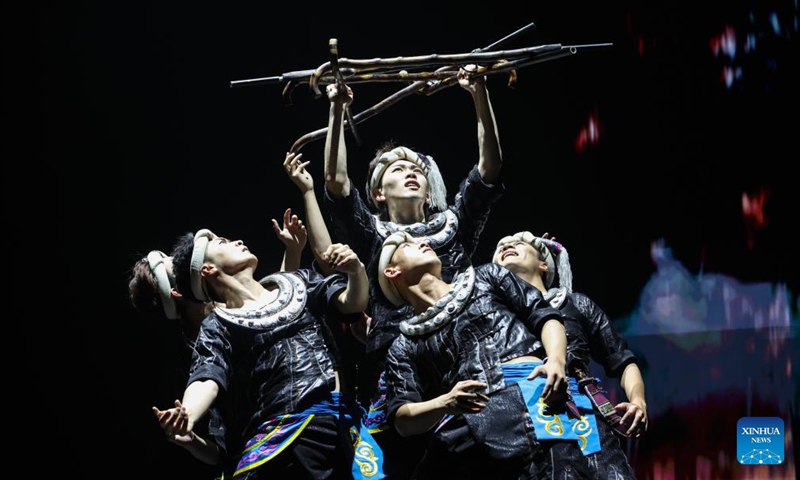 Artists from Guizhou Provincial Song and Dance Theatre perform during a cultural exchange event in Santiago, Chile, June 12, 2026. A cultural exchange event was held in Santiago on Friday to celebrate the International Day for Dialogue among Civilizations and mark the inauguration of the China Cultural Center in Santiago. (Xinhua/Zhou Jiayi)