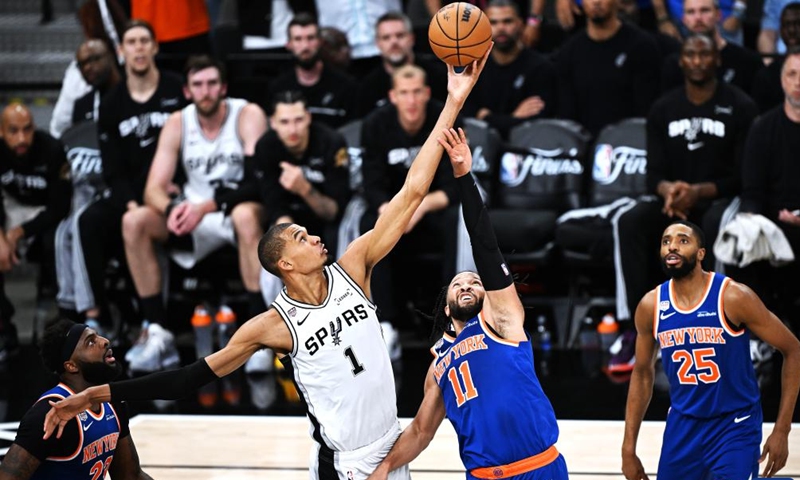 Victor Wembanyama (2nd L) of San Antonio Spurs competes during the final game 5 between New York Knicks and San Antonio Spurs at the 2025-2026 NBA basketball game in San Antonio, the United States, June 13, 2026. (Xinhua/Wu Xiaoling)