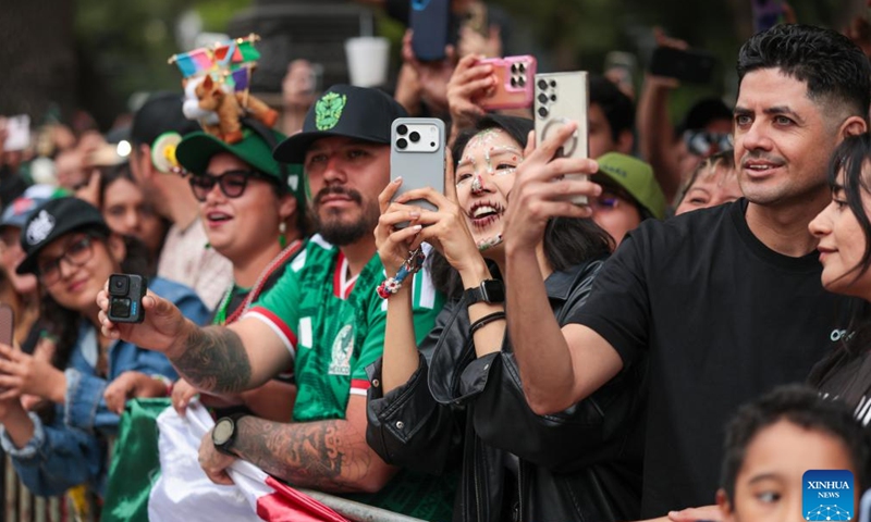 People take part in a World Cup parade in Mexico City, capital of Mexico, June 13, 2026. (Xinhua/Alejandro Medina)
