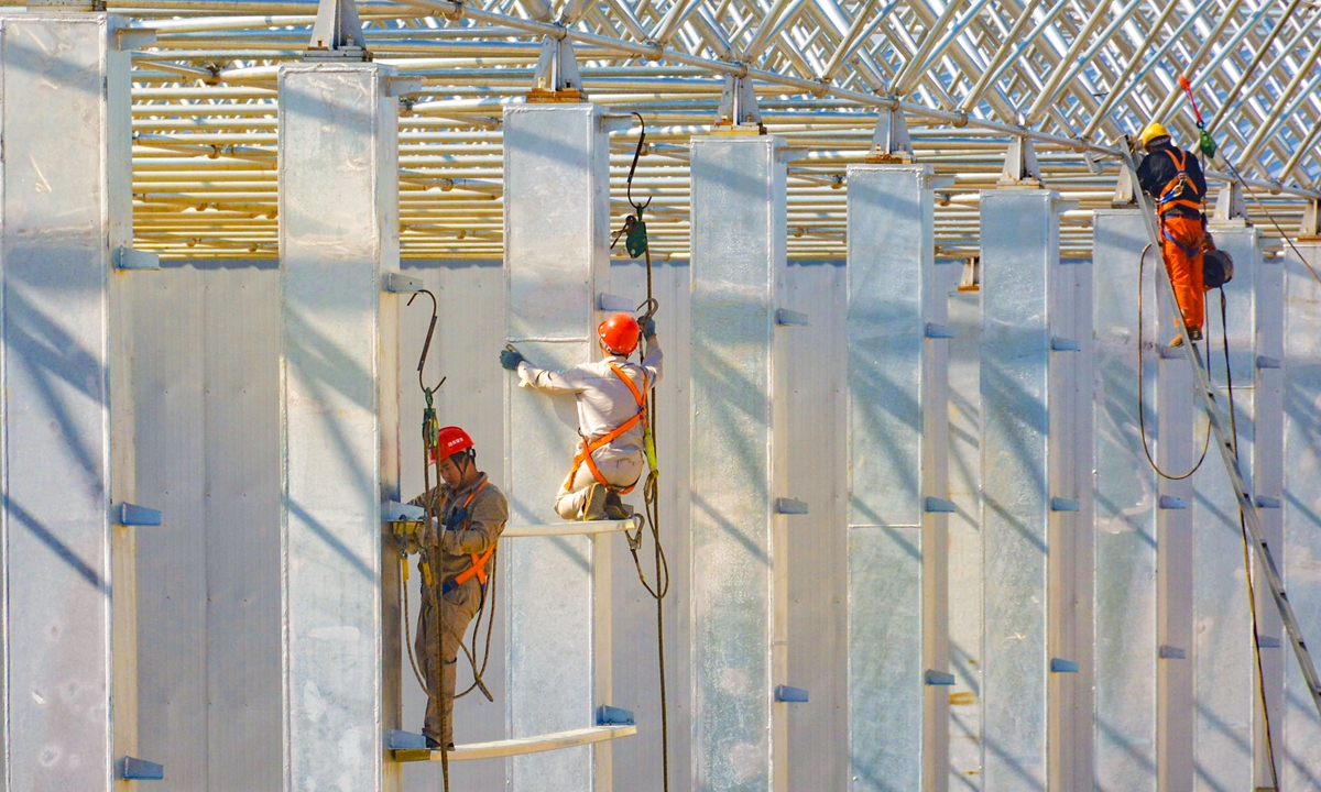 Workers carry out main structure construction at the site of a modern agricultural industrial base project in Yuexi, Anqing of East China's Anhui Province, on June 14, 2026. Photo: VCG