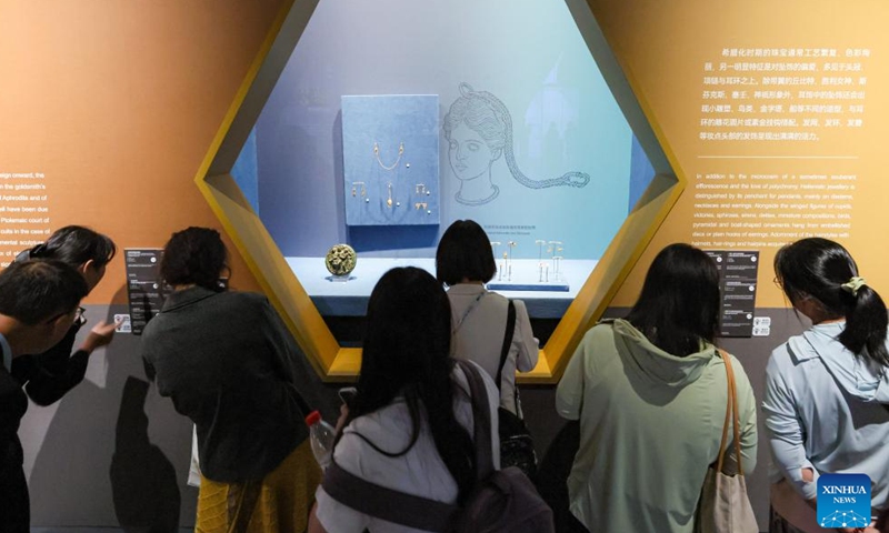 People visit an exhibition themed Art in Gold: Jewellery in Hellenistic Times at the Shaanxi History Museum in Xi'an, northwest China's Shaanxi Province, June 14, 2026. Gathering 250 pieces or sets of exhibits from 25 Greek museums and archaeological institutions, the exhibition kicked off here on Sunday and will conclude on Nov. 29, 2026. (Photo by Wang Jing/Xinhua)