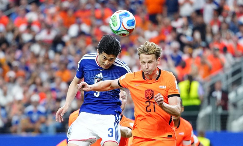 Taniguchi Shogo (L) of Japan vies with Frenkie de Jong of the Netherlands during the group F match between the Netherlands and Japan at the 2026 FIFA World Cup at the Dallas Stadium in Dallas, the United States, on June 14, 2026. (Xinhua/Jia Haocheng)