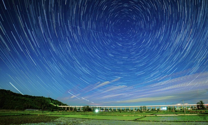 This stack composite photo taken on May 29, 2026 shows paddy fields under starry sky in Shangzhi City, northeast China's Heilongjiang Province. (Photo by Zeng Dong/Xinhua)