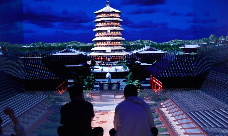 Tourists view Yingxian wooden pagoda at a digital immersive experience zone in Yingxian County, north China's Shanxi Province, May 12, 2026..Photo: Xinhua