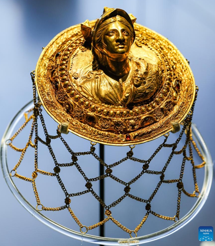 This photo taken on June 14, 2026 shows an exhibit at an exhibition themed Art in Gold: Jewellery in Hellenistic Times in the Shaanxi History Museum in Xi'an, northwest China's Shaanxi Province. Gathering 250 pieces or sets of exhibits from 25 Greek museums and archaeological institutions, the exhibition kicked off here on Sunday and will conclude on Nov. 29, 2026. (Photo by Wang Jing/Xinhua)