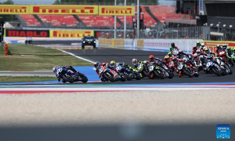 Valentin Debise (2nd L) of EASTROC ZXMOTO Evan Bros Factory competes during the race 2 of WorldSSP at the FIM Supersport World Championship Emilia Romagna Round in Misano Adriatico, Italy, June 14, 2026. (Xinhua/Li Jing)
