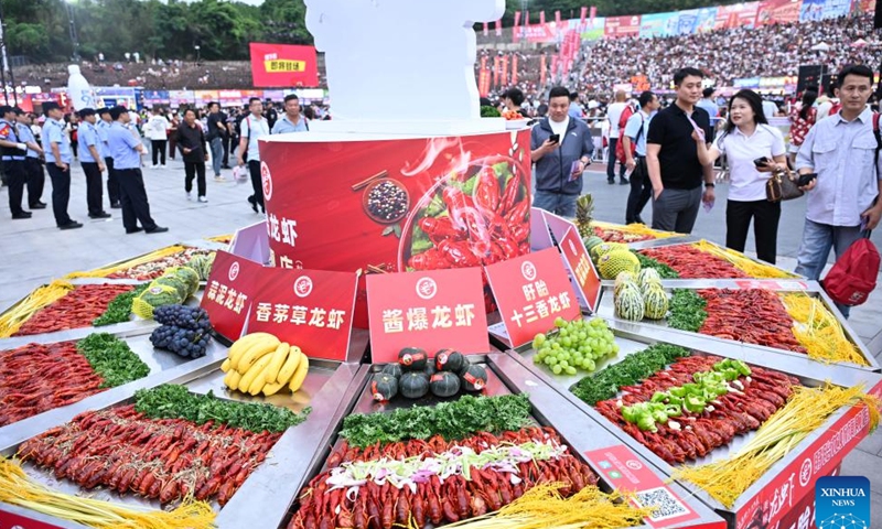 This photo taken on June 12, 2026 shows crayfish dishes during a crayfish festival in Xuyi County of Huai'an, east China's Jiangsu Province. A crayfish festival kicked off Friday in Xuyi County, a major crayfish base in east China's Jiangsu Province, offering a feast for crayfish fans.
The three-day event, with approximately 40,000 tickets sold, is expected to sell 120 tons of crayfish during this period, which will effectively drive consumption in catering, accommodation, and retail. (Xinhua/Ji Chunpeng)
