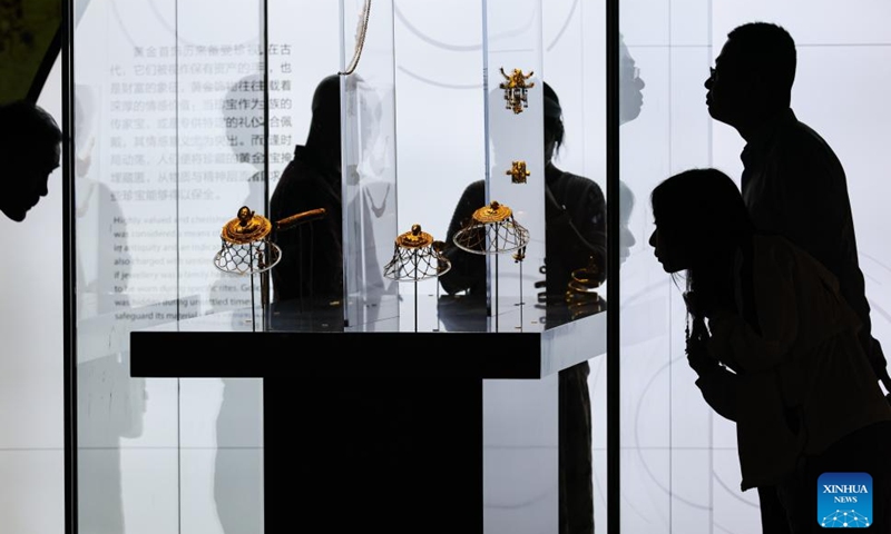 People view exhibits at an exhibition themed Art in Gold: Jewellery in Hellenistic Times in the Shaanxi History Museum in Xi'an, northwest China's Shaanxi Province, June 14, 2026. Gathering 250 pieces or sets of exhibits from 25 Greek museums and archaeological institutions, the exhibition kicked off here on Sunday and will conclude on Nov. 29, 2026. (Photo by Wang Jing/Xinhua)