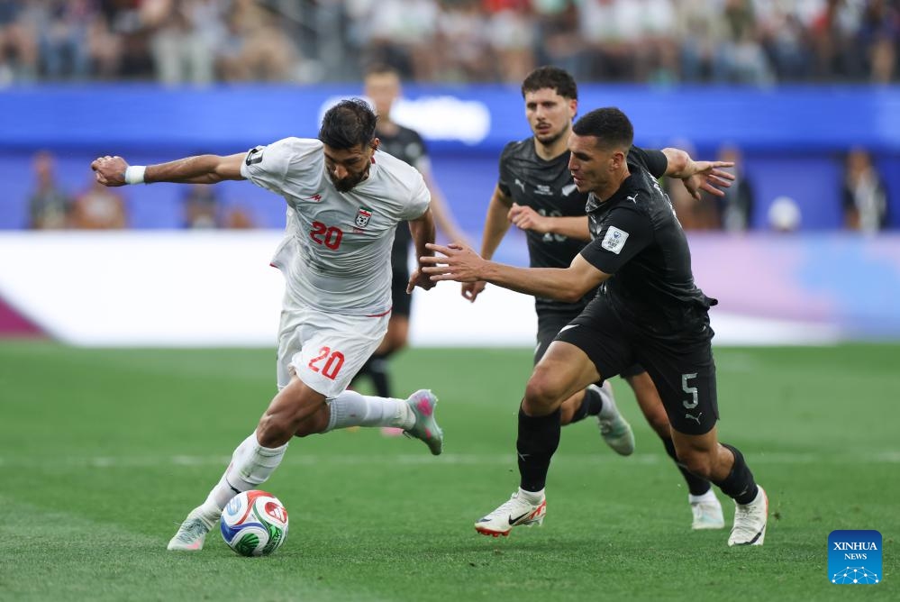 Shahriyar Moghanloo (L) of Iran and Michael Boxall of New Zealand compete during the group G match between Iran and New Zealand at the 2026 FIFA World Cup at Los Angeles Stadium in Los Angeles, the United States, June 15, 2026. (Photo: Xinhua)