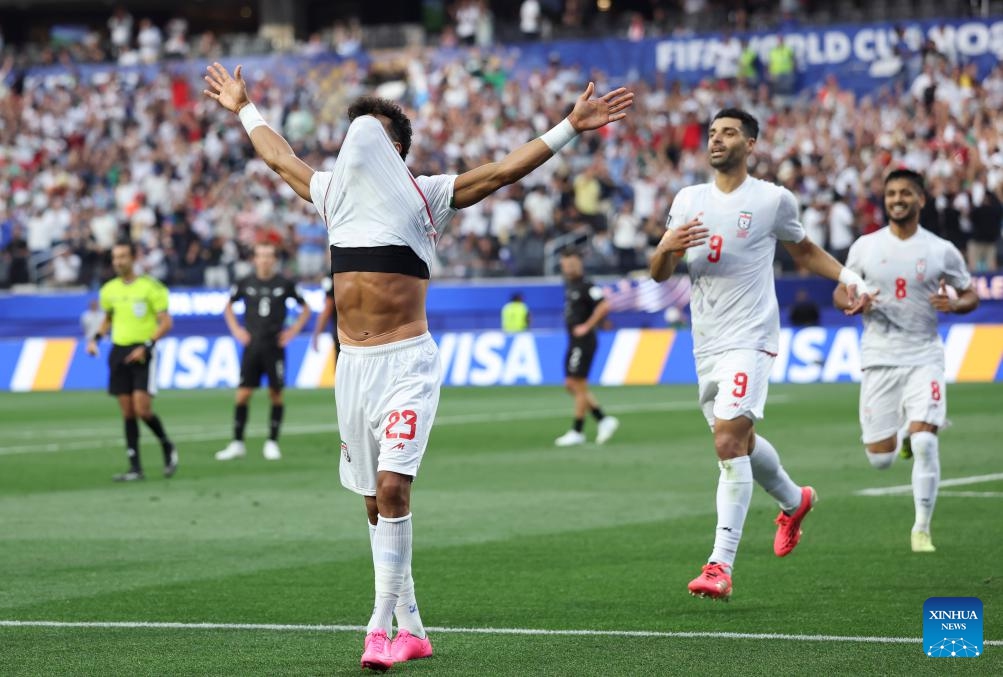 Ramin Rezaeian (L) of Iran celebrates his score during the group G match between Iran and New Zealand at the 2026 FIFA World Cup at Los Angeles Stadium in Los Angeles, the United States, June 15, 2026. (Photo: Xinhua)