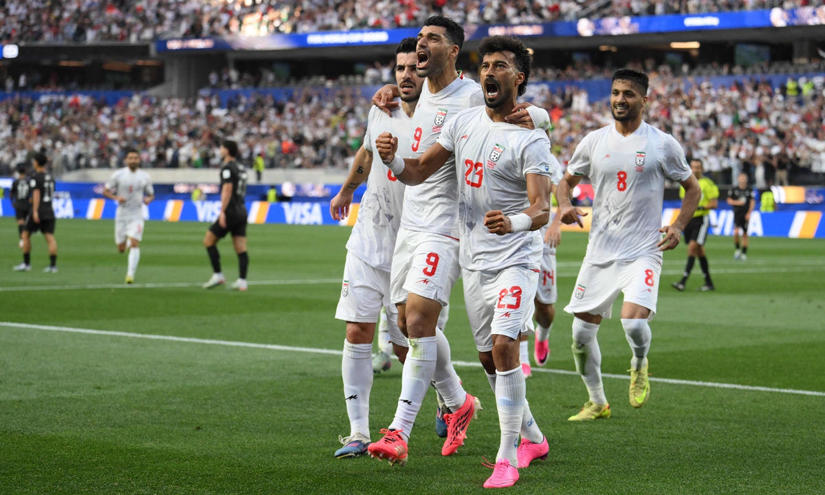 Iranian players celebrate after Ramin Rezaeian (No.23) scoring his team's first goal during the FIFA World Cup 2026 Group G match between IR Iran and New Zealand at Los Angeles Stadium on June 15, 2026 in Los Angeles, California. Photo: VCG