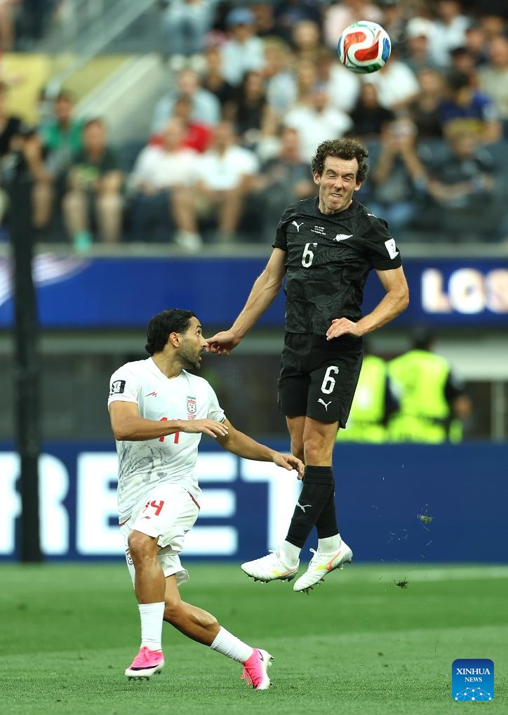 Joe Bell (top) of New Zealand fights for a head ball during the group G match between Iran and New Zealand at the 2026 FIFA World Cup at Los Angeles Stadium in Los Angeles, the United States, June 15, 2026. (Photo: Xinhua)