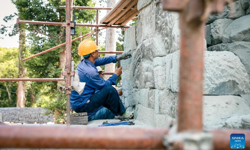 A staff member works at the restoration site of the South Gate of the Ta Prohm temple in Siem Reap province, Cambodia, May 26, 2026. The restoration of the South Gate of the centuries-old Ta Prohm temple in the Angkor Archaeological Park in northwest Cambodia is expected to be completed by the end of 2026, said an APSARA National Authority (ANA) news release on Monday. (Photo: Xinhua)