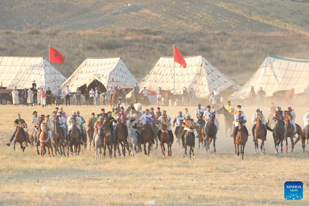 Riders compete during the 14th edition of the MATA International Equestrian Festival in Larache, Morocco, June 14, 2026. (Photo: Xinhua)