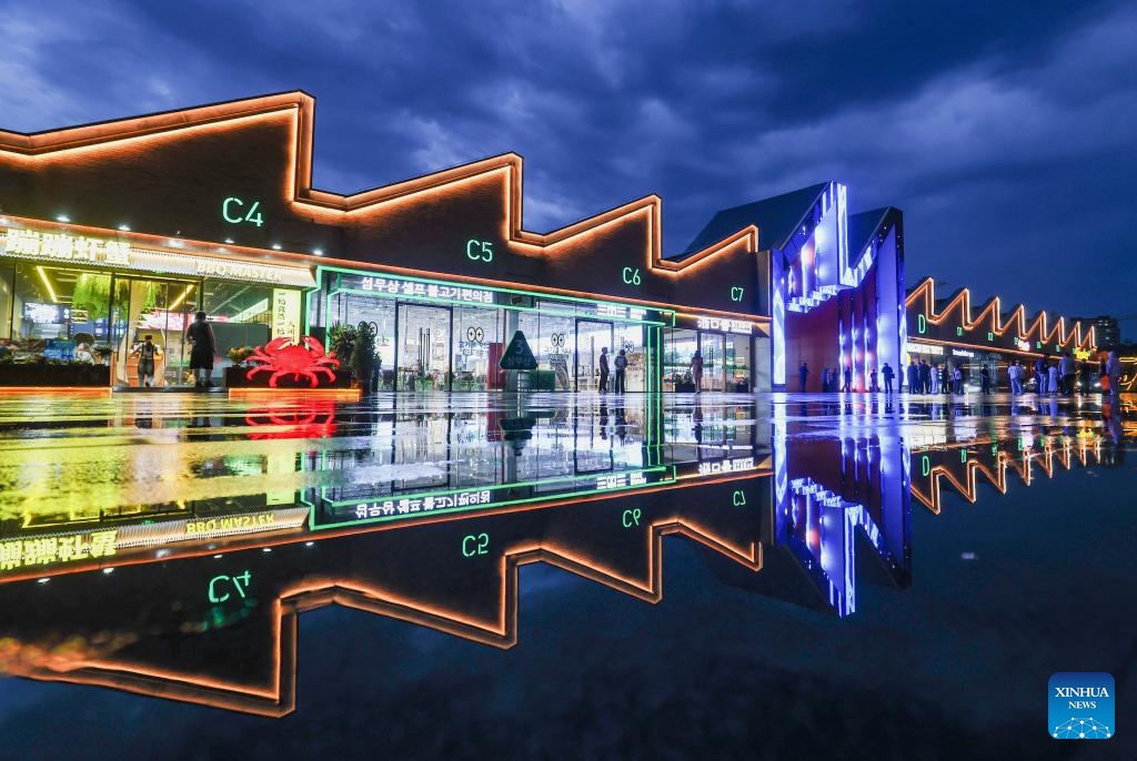 People visit a cultural and art park, transformed from the former cotton textile factories, in Shijiazhuang City, north China's Hebei Province, June 12, 2026. In recent years, Shijiazhuang has advanced the protection and utilization of industrial heritage, injecting new vitality to the city's development. A number of old factory buildings and former industrial sites have been transformed into urban cultural landmarks, leisure and sports parks, creative markets and other new spaces. (Photo: Xinhua)