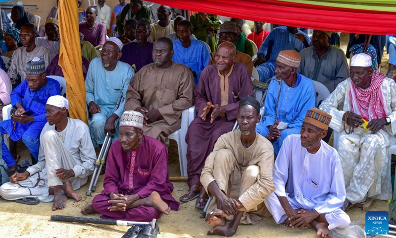 People attend the inauguration ceremony of a vocational training center and tricycle workshop in Maiduguri, Nigeria, June 15, 2026. (Photo: Xinhua)