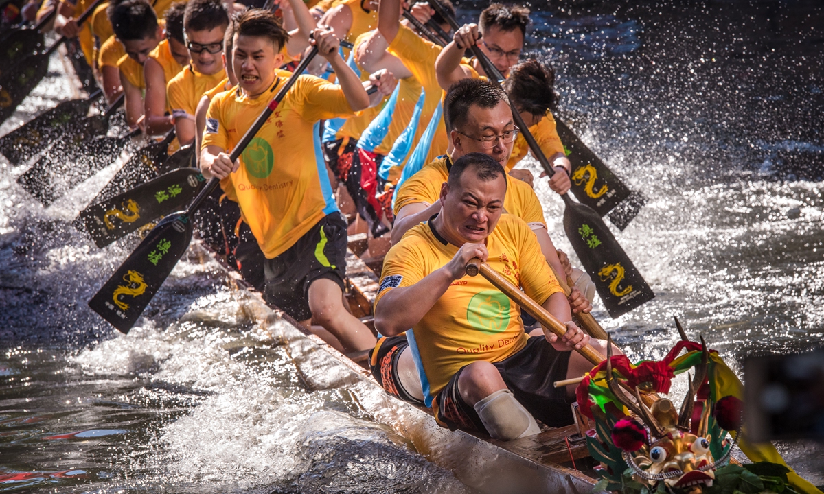 One of the local dragon boat teams from Diejiao village, Foshan in Guangdong Province, competes in the race.