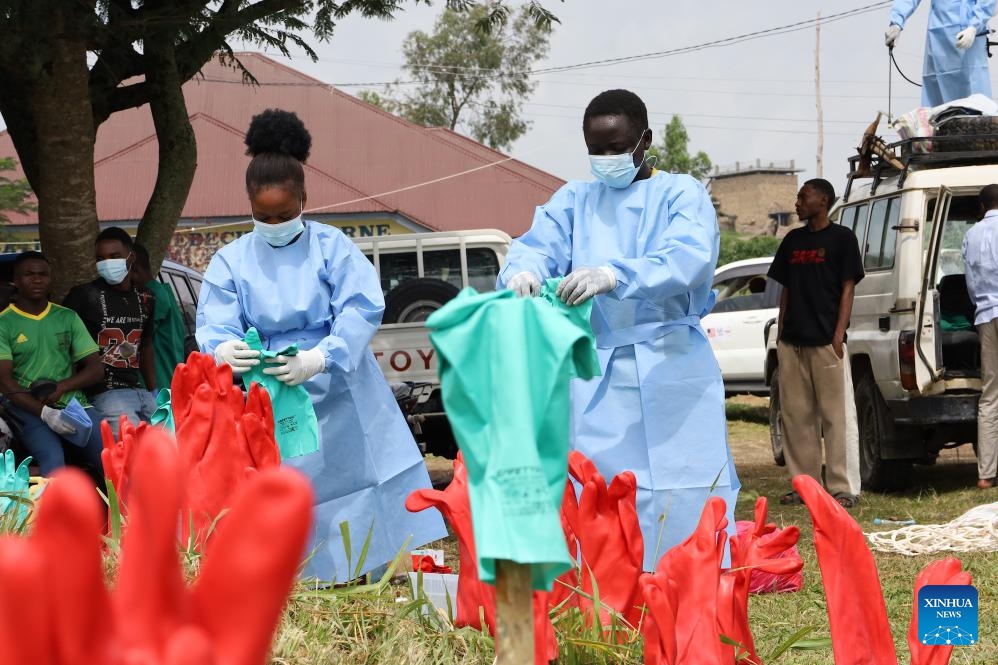 Health workers dry disinfected gloves at an Ebola treatment center in Rwampara in eastern Democratic Republic of the Congo, on June 16, 2026. The number of confirmed Ebola cases in the Democratic Republic of the Congo has risen to 837, including 196 deaths, as health authorities and international partners warned that the outbreak continues to deteriorate with sustained community transmission and geographic expansion. (Xinhua)