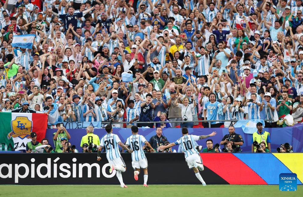 Players of Argentina celebrate their first score by Lionel Messi (R, bottom) during the group J match between Argentina and Algeria at the FIFA World Cup 2026 at Kansas City Stadium in Kansas City, the United States, June 16, 2026. (Xinhua/Li Ming)
