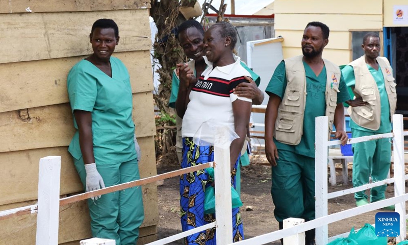 A health worker embraces a cured patient at an Ebola treatment center in Rwampara in eastern Democratic Republic of the Congo, on June 16, 2026. The number of confirmed Ebola cases in the Democratic Republic of the Congo has risen to 837, including 196 deaths, as health authorities and international partners warned that the outbreak continues to deteriorate with sustained community transmission and geographic expansion. (Xinhua)