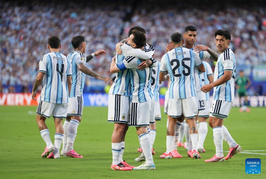 Players of Argentina celebrate their first score by Lionel Messi (R, front) during the group J match between Argentina and Algeria at the FIFA World Cup 2026 at Kansas City Stadium in Kansas City, the United States, June 16, 2026. (Xinhua/Du Yu)