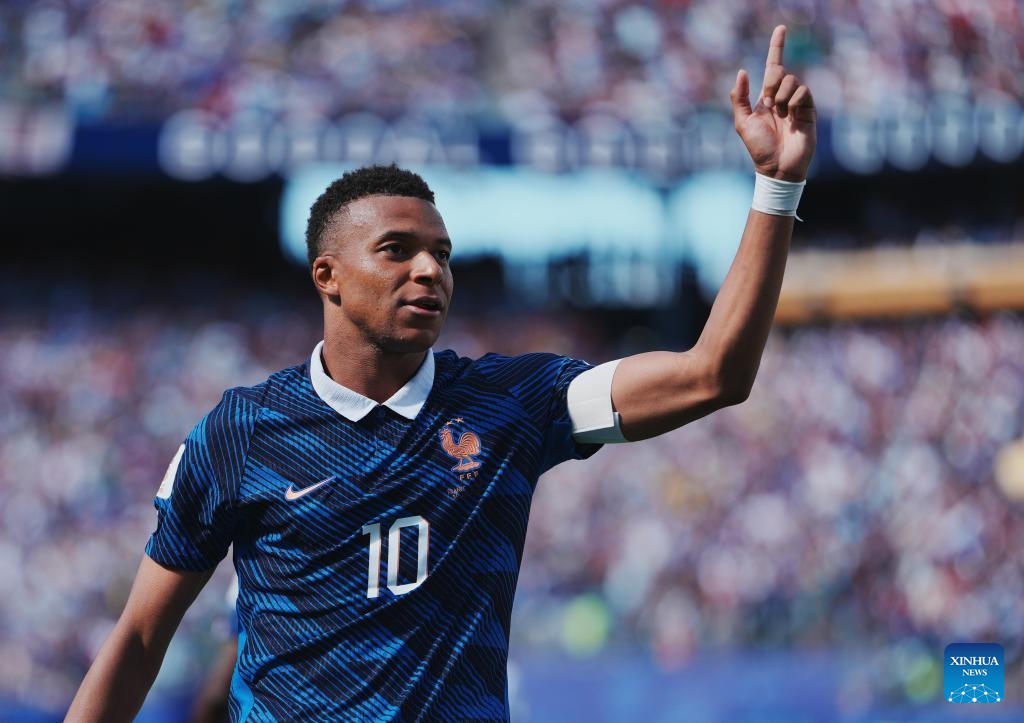 Kylian Mbappe of France celebrates his score during the group I match between France and Senegal at the 2026 FIFA World Cup at New York New Jersey Stadium in New York, the United States, June 16, 2026. (Xinhua/Xu Chang)