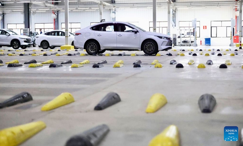 A vehicle goes through road vibration test at the production base complex of BYD in Camacari, Bahia State, Brazil, June 15, 2026. About 50 kilometers away from Salvador, the capital of the northeastern Brazilian state of Bahia, the Camacari production base complex of Chinese auto manufacturer BYD has been put into operation since last year. (Xinhua/Jin Haoyuan)