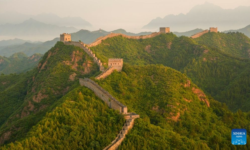 This photo taken on June 18, 2026 shows the scenery of the Jinshanling section of the Great Wall in the morning at Luanping County, north China's Hebei Province. (Photo by Zhou Wanping/Xinhua)