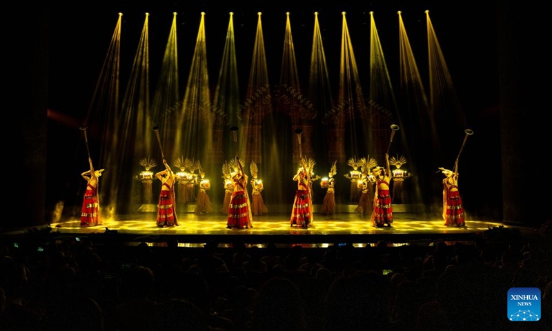 Actors perform during the Mountains Rivers Show in Lijiang, southwest China's Yunnan Province, June 17, 2026. Since its premiere in Lijiang in May 2002, the show has been a long-running hit in 24 years, staging over 21,000 times, and has drawn an audience of about 20 million . (Xinhua/Hu Chao)