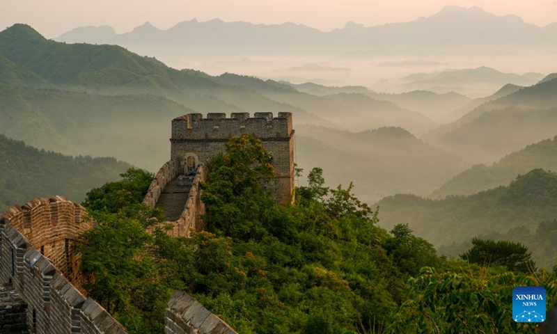 This photo taken on June 18, 2026 shows the scenery of the Jinshanling section of the Great Wall in the morning at Luanping County, north China's Hebei Province. (Photo by Zhou Wanping/Xinhua)