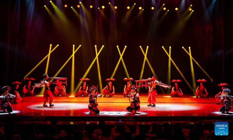 Actors perform during the Mountains Rivers Show in Lijiang, southwest China's Yunnan Province, June 17, 2026. Since its premiere in Lijiang in May 2002, the show has been a long-running hit in 24 years, staging over 21,000 times, and has drawn an audience of about 20 million . (Xinhua/Hu Chao)