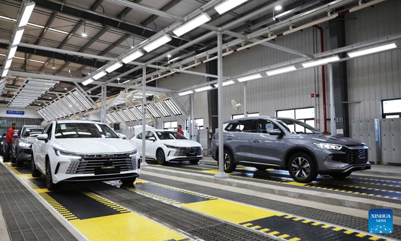 Vehicles are pictured after going through the water-spray test at the production base complex of BYD in Camacari, Bahia State, Brazil, June 15, 2026. About 50 kilometers away from Salvador, the capital of the northeastern Brazilian state of Bahia, the Camacari production base complex of Chinese auto manufacturer BYD has been put into operation since last year. (Xinhua/Jin Haoyuan)