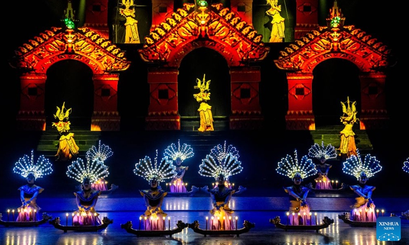 Actors perform during the Mountains Rivers Show in Lijiang, southwest China's Yunnan Province, June 17, 2026. Since its premiere in Lijiang in May 2002, the show has been a long-running hit in 24 years, staging over 21,000 times, and has drawn an audience of about 20 million . (Xinhua/Hu Chao)
