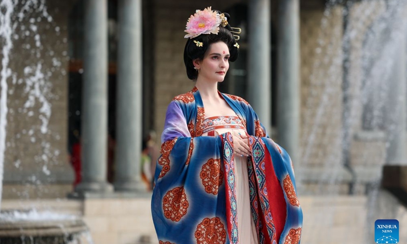 A foreign student presents traditional Chinese costumes during a fashion show at Tianjin Foreign Studies University in north China's Tianjin, June 17, 2026. A show focusing on traditional Chinese costumes was held here on Wednesday as part of this year's Tianjin Fashion Week. Models and foreign students trooped the runway to bridge China and rest parts of the world with wearable creations that inspire cultural exchange and mutual learning. (Xinhua/Sun Fanyue)