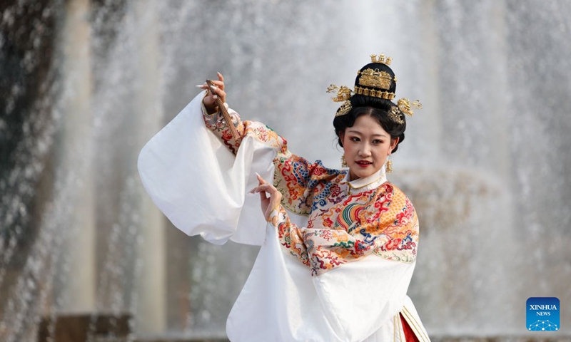 A model presents traditional Chinese costumes during a fashion show at Tianjin Foreign Studies University in north China's Tianjin, June 17, 2026. A show focusing on traditional Chinese costumes was held here on Wednesday as part of this year's Tianjin Fashion Week. Models and foreign students trooped the runway to bridge China and rest parts of the world with wearable creations that inspire cultural exchange and mutual learning. (Xinhua/Sun Fanyue)
