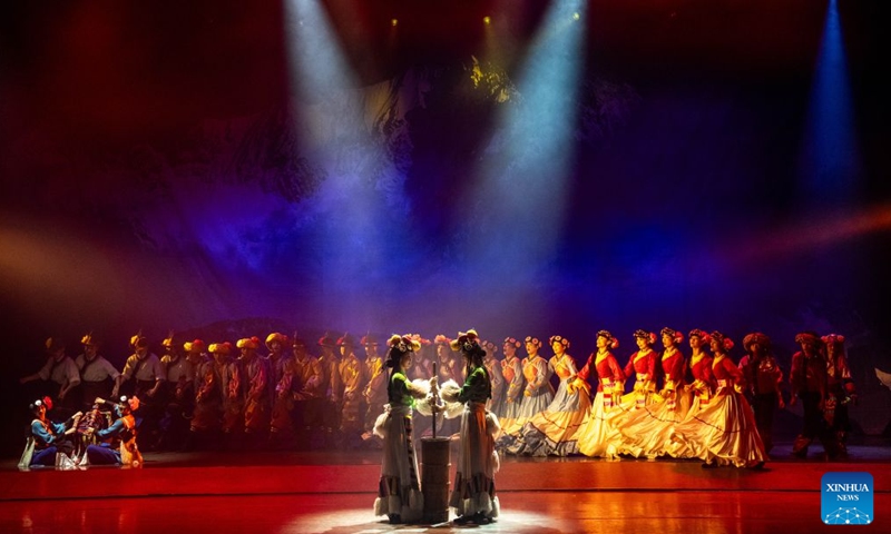 Actors perform during the Mountains Rivers Show in Lijiang, southwest China's Yunnan Province, June 17, 2026. Since its premiere in Lijiang in May 2002, the show has been a long-running hit in 24 years, staging over 21,000 times, and has drawn an audience of about 20 million . (Xinhua/Hu Chao)