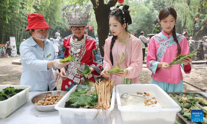 People attend a Zongzi making contest in a village in Yinan County, Linyi City, east China's Shandong Province, June 20, 2026. Friday marks the Duanwu Festival, or Dragon Boat Festival, a traditional festival celebrated on the 5th day of the 5th month in the traditional Chinese calendar.

The festival is best known for holding dragon boat race, eating Zongzi, sticky rice dumplings wrapped with bamboo or reed leaves, and hanging mugwort and calamus as symbol of health and protection. Photo: Xinhua