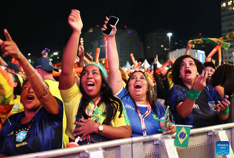 Brazilian football fans celebrate a goal while watching the live broadcast of the group C match between Brazil and Haiti at the 2026 FIFA World Cup at the Copacabana Beach in Rio de Janeiro, Brazil, on June 19, 2026. (Xinhua/Jin Haoyuan)