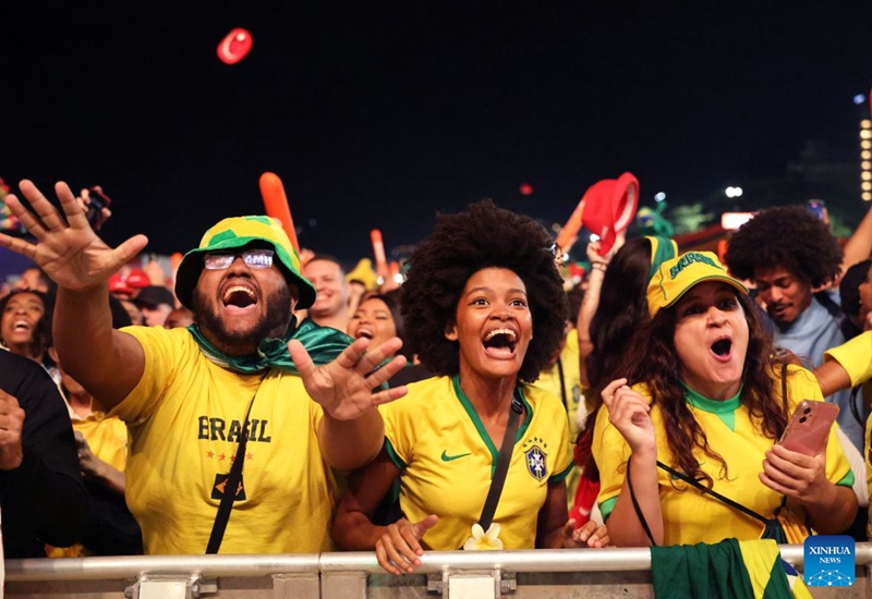 Brazilian football fans celebrate a goal while watching the live broadcast of the group C match between Brazil and Haiti at the 2026 FIFA World Cup at the Copacabana Beach in Rio de Janeiro, Brazil, on June 19, 2026. (Xinhua/Jin Haoyuan)