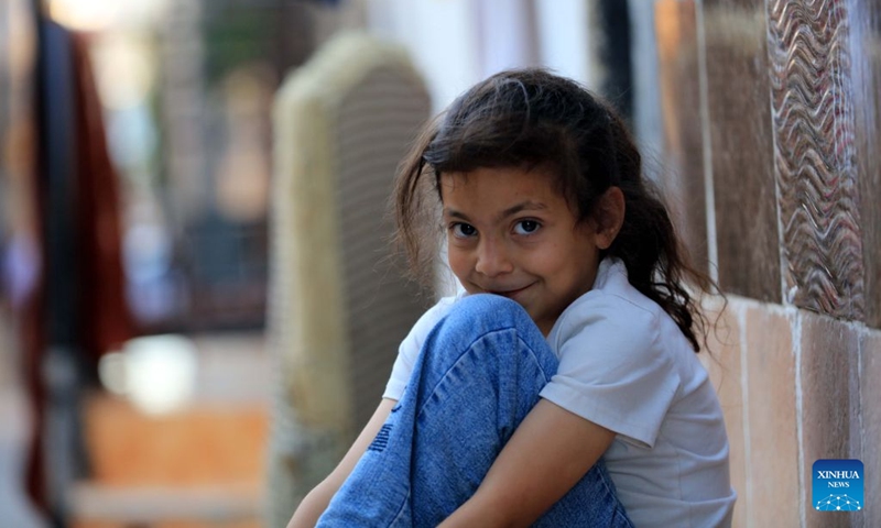 This photo taken on June 17, 2026 shows a girl in Baqa'a refugee camp, about 20 kilometers north of Amman, Jordan. Commemorated annually on June 20, World Refugee Day honors and celebrates the strength and bravery of refugees, individuals forced to flee their homelands due to conflicts, persecution or human rights violations.

In the Middle East, where wars, conflicts and instability continue, a large number of people have been forced to flee their homes and embark on the path of displacement. Photo: Xinhua