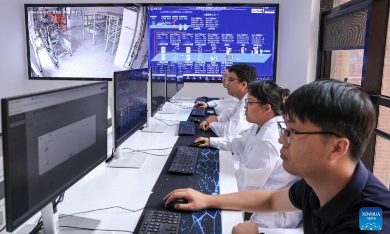 Staff members work at an intelligent manufacturing control room of the National Modern TCM Innovation Center in north China's Tianjin, June 18, 2026. The National Modern TCM Innovation Center has been dedicated to improving the quality and efficiency of the traditional Chinese medicine (TCM) industry. It focuses on areas such as high-quality TCM material supply, modernized TCM production, intelligent transformation of equipment, and market-oriented application. Photo: Xinhua