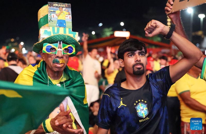 Brazilian football fans cheer for team Brazil while watching the live broadcast of the group C match between Brazil and Haiti at the 2026 FIFA World Cup at the Copacabana Beach in Rio de Janeiro, Brazil, on June 19, 2026. (Xinhua/Jin Haoyuan)