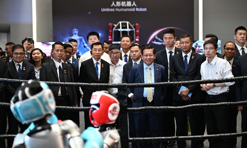 President of Myanmar Min Aung Hlaing, who is on a state visit to China, visits the Unitree Robotics in Hangzhou, east China's Zhejiang Province, on June 19, 2026. (Xinhua/Liu Mingxiang)