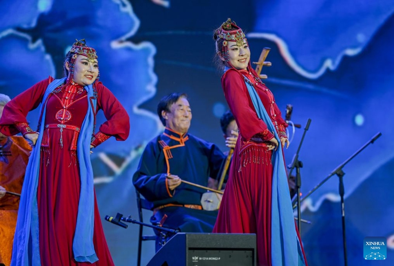 Performers dance on stage during a folk song event held in Wuhai City, north China's Inner Mongolia Autonomous Region, June 16, 2026. (Xinhua/Lian Zhen)