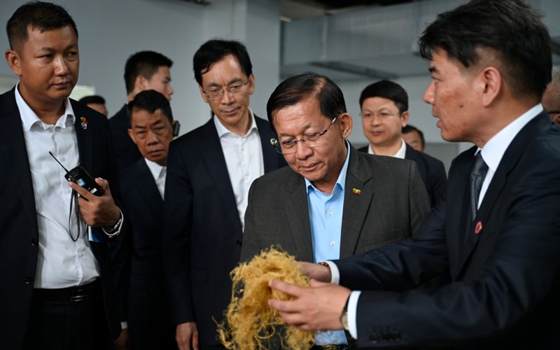 President of Myanmar Min Aung Hlaing, who is on a state visit to China, visits the Zhejiang Qingshi New Material Technology Co., Ltd. in Hangzhou, east China's Zhejiang Province, on June 19, 2026. (Xinhua/Liu Mingxiang)