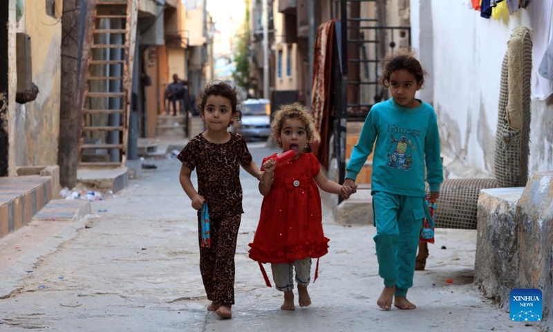 This photo taken on June 17, 2026 shows children walking in Baqa'a refugee camp, about 20 kilometers north of Amman, Jordan. Commemorated annually on June 20, World Refugee Day honors and celebrates the strength and bravery of refugees, individuals forced to flee their homelands due to conflicts, persecution or human rights violations.

In the Middle East, where wars, conflicts and instability continue, a large number of people have been forced to flee their homes and embark on the path of displacement. Photo: Xinhua